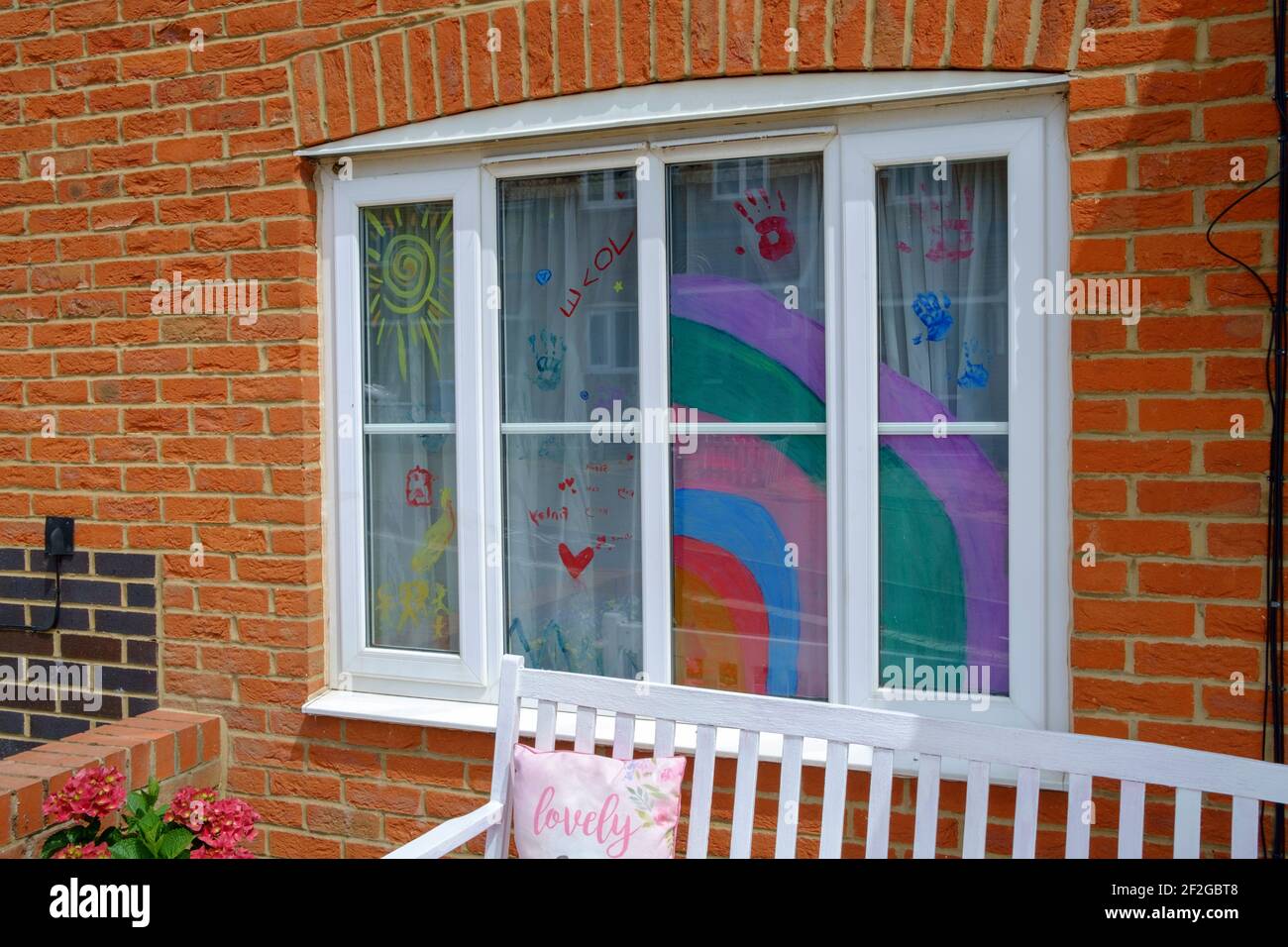 NHS Rainbows placed in windows to thank the NHS during the Covid-19 Pandemic Stock Photo