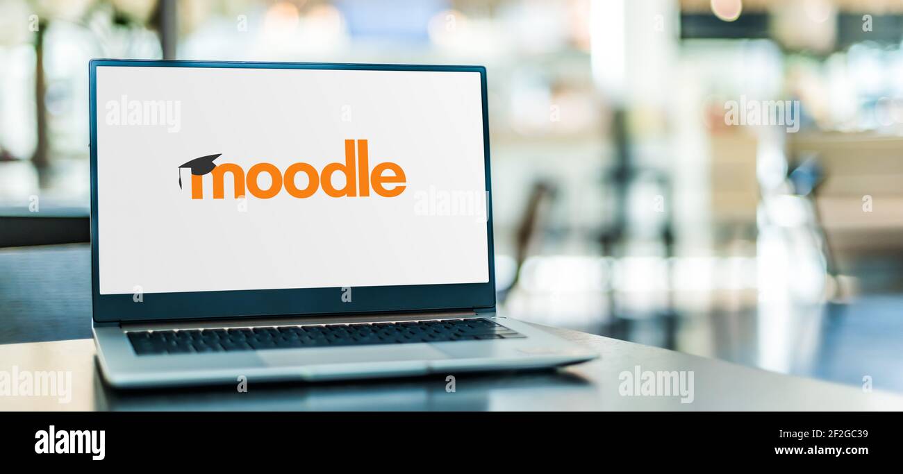 POZNAN, POL - FEB 6, 2021: Laptop computer displaying logo of Moodle, a free and open-source learning management system (LMS) written in PHP and distr Stock Photo