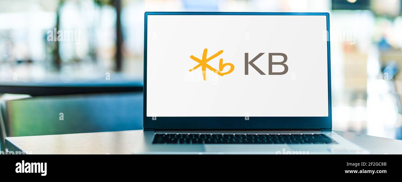 POZNAN, POL - FEB 6, 2021: Laptop computer displaying logo of KB Kookmin Bank, one of the largest banks in South Korea Stock Photo