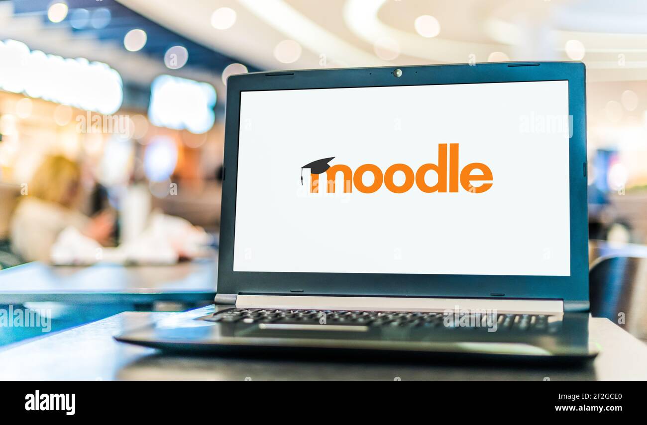 POZNAN, POL - FEB 6, 2021: Laptop computer displaying logo of Moodle, a free and open-source learning management system (LMS) written in PHP and distr Stock Photo
