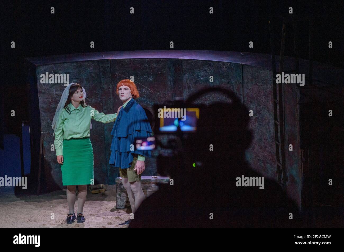 12 March 2021, Saxony-Anhalt, Magdeburg: Freda Winter (l) alias Elke and Richard Barborka (r) as Hauke Haien rehearse a scene from the play 'Der Schimmelreiter' at the Puppentheater Magdeburg. In its series of livestreams, the Puppentheater Magdeburg is performing a play for adults for the first time this weekend. The focus is on the ambitious and egotistical Hauke Haien, who rises from humble beginnings to become a dike count. It is the fifth play to be shown via livestream. According to the theatre, more than 3200 tickets for the livestreams have been sold so far. Photo: Klaus-Dietmar Gabber Stock Photo