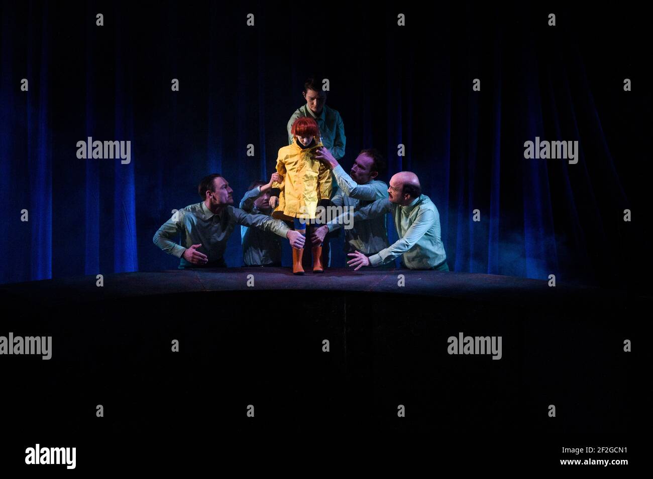 12 March 2021, Saxony-Anhalt, Magdeburg: Richard Barborka (l-r), Jana Weichelt, Freda Winter, Lennart Morgenstern and Florian Kräuter play the puppet Hauke Haien at the Puppentheater Magdeburg during the dress rehearsal of the play 'Der Schimmelreiter'. In its series of livestreams, the Puppentheater Magdeburg is performing a play for adults for the first time this weekend. The focus is on the ambitious and egotistical Hauke Haien, who rises from humble beginnings to become a dike count. It is the fifth play to be shown via livestream. According to the theatre, more than 3200 tickets for the l Stock Photo
