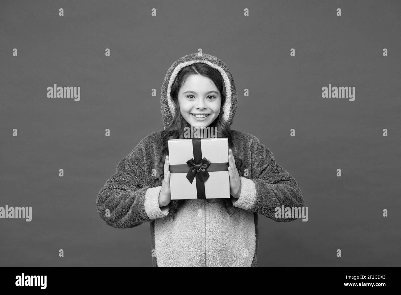 happy kid wear rabbit kigurumi and hold surprise box. gifts and ...