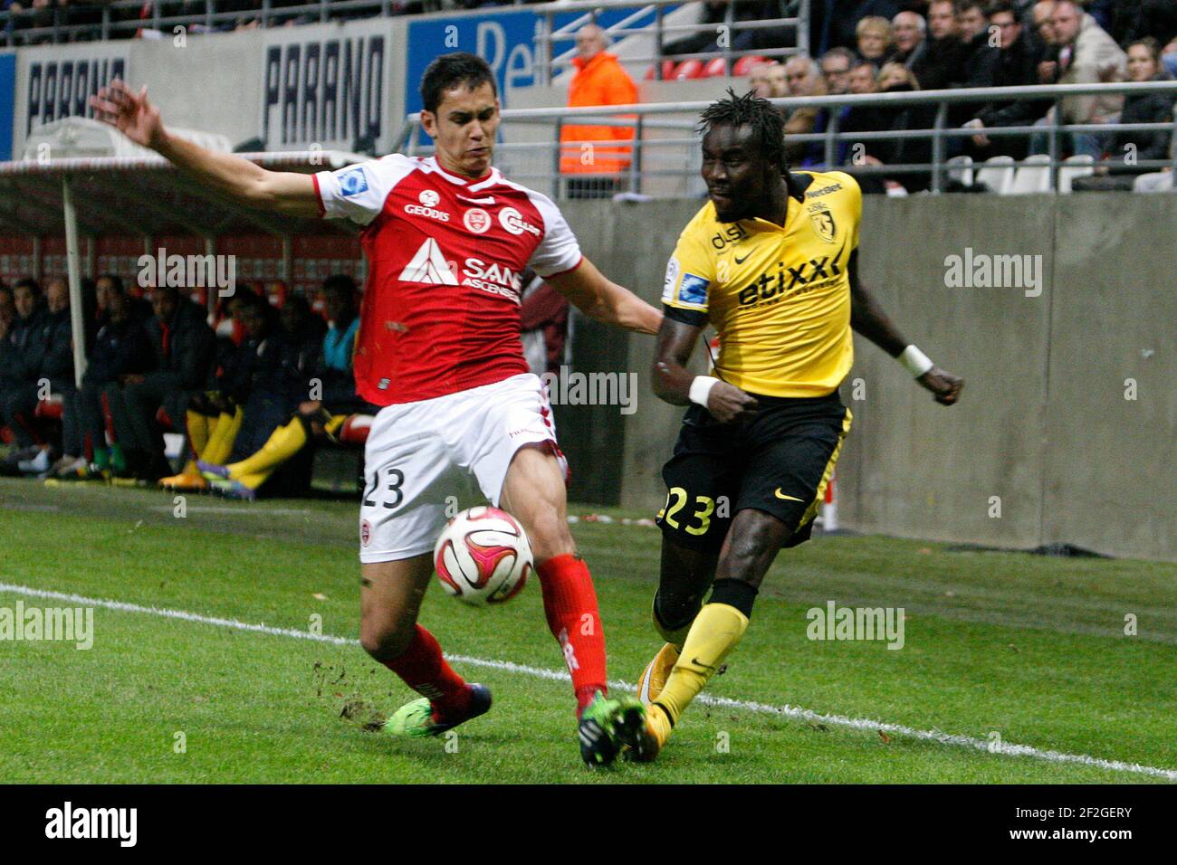 Aissa MANDI (23 Reims) and Pape SOUARE (23 Lille) during the L1 french champ between Stade de Reims and Lille LOSC at Auguste Delaune stadium on november 09, 2014 - Photo Anthony Serpe / DPPI Stock Photo