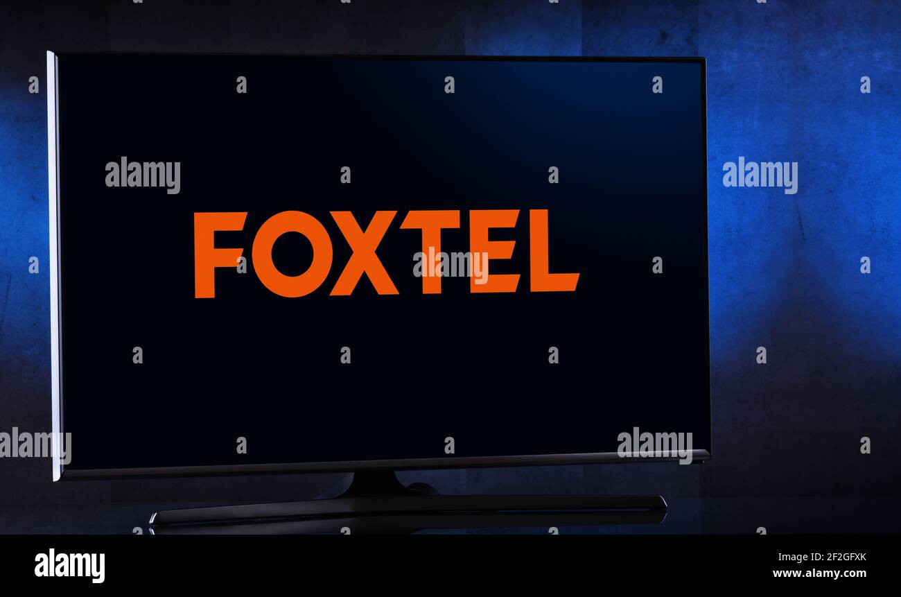 POZNAN, POL - FEB 6, 2021: Flat-screen TV set displaying logo of Foxtel, an Australian pay television company—operating in cable television, direct br Stock Photo