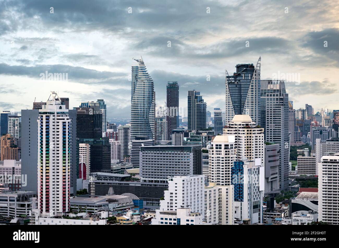 Crowded city with high rise building in downtown at business district ...