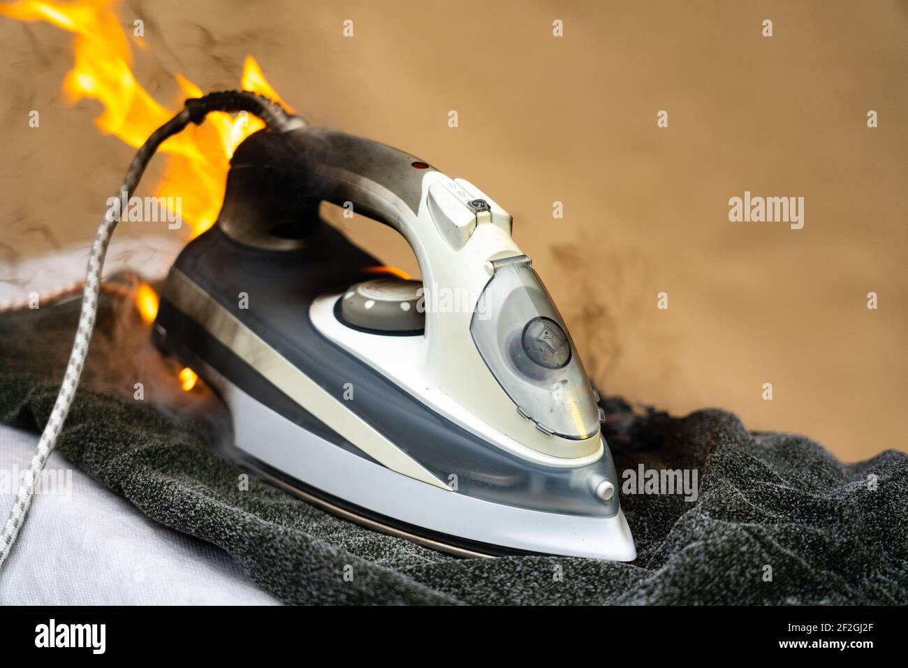 Burnt clothes, ironing hires stock photography and images Alamy