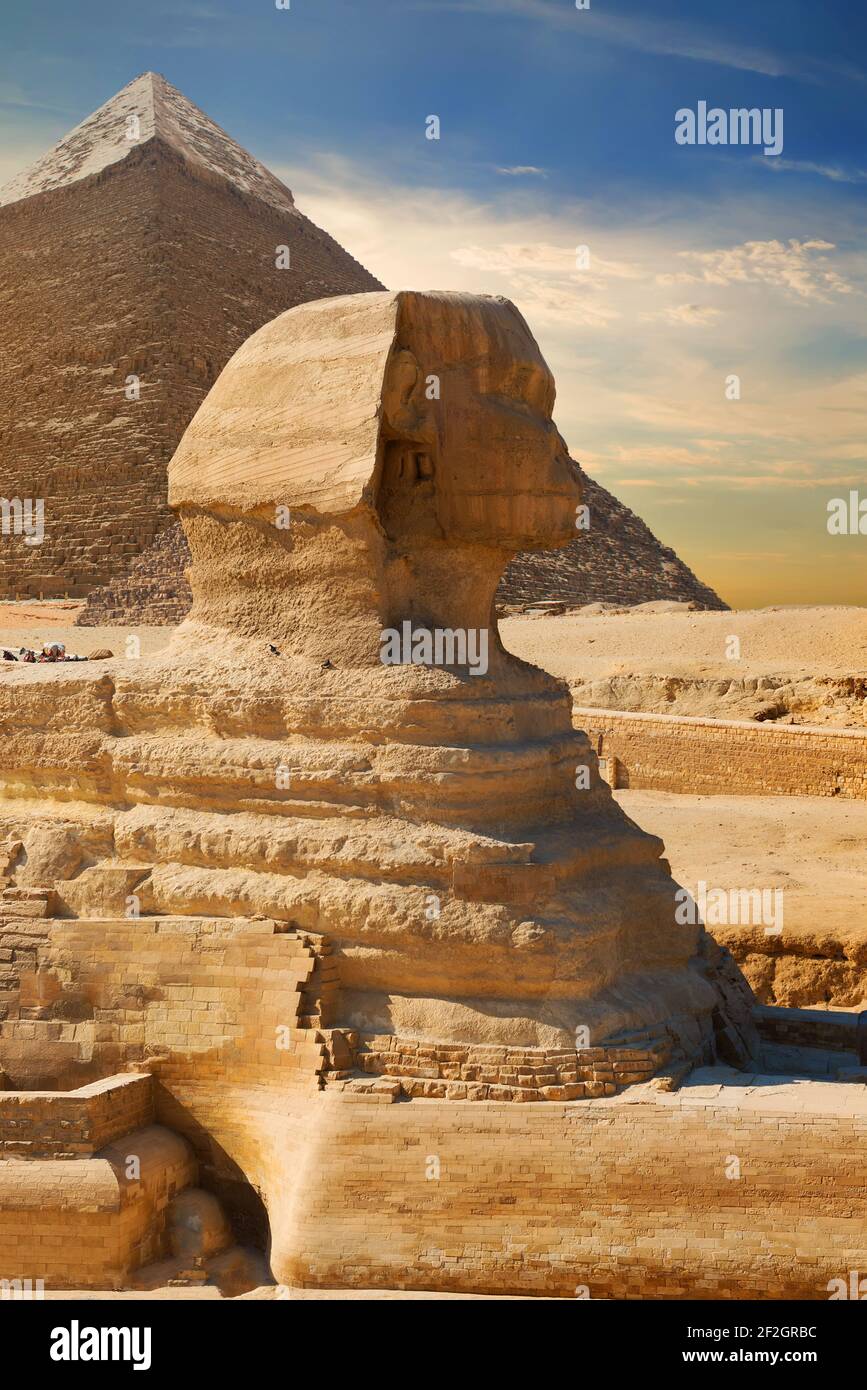 Sphinx and pyramid in the egyptian desert Stock Photo - Alamy