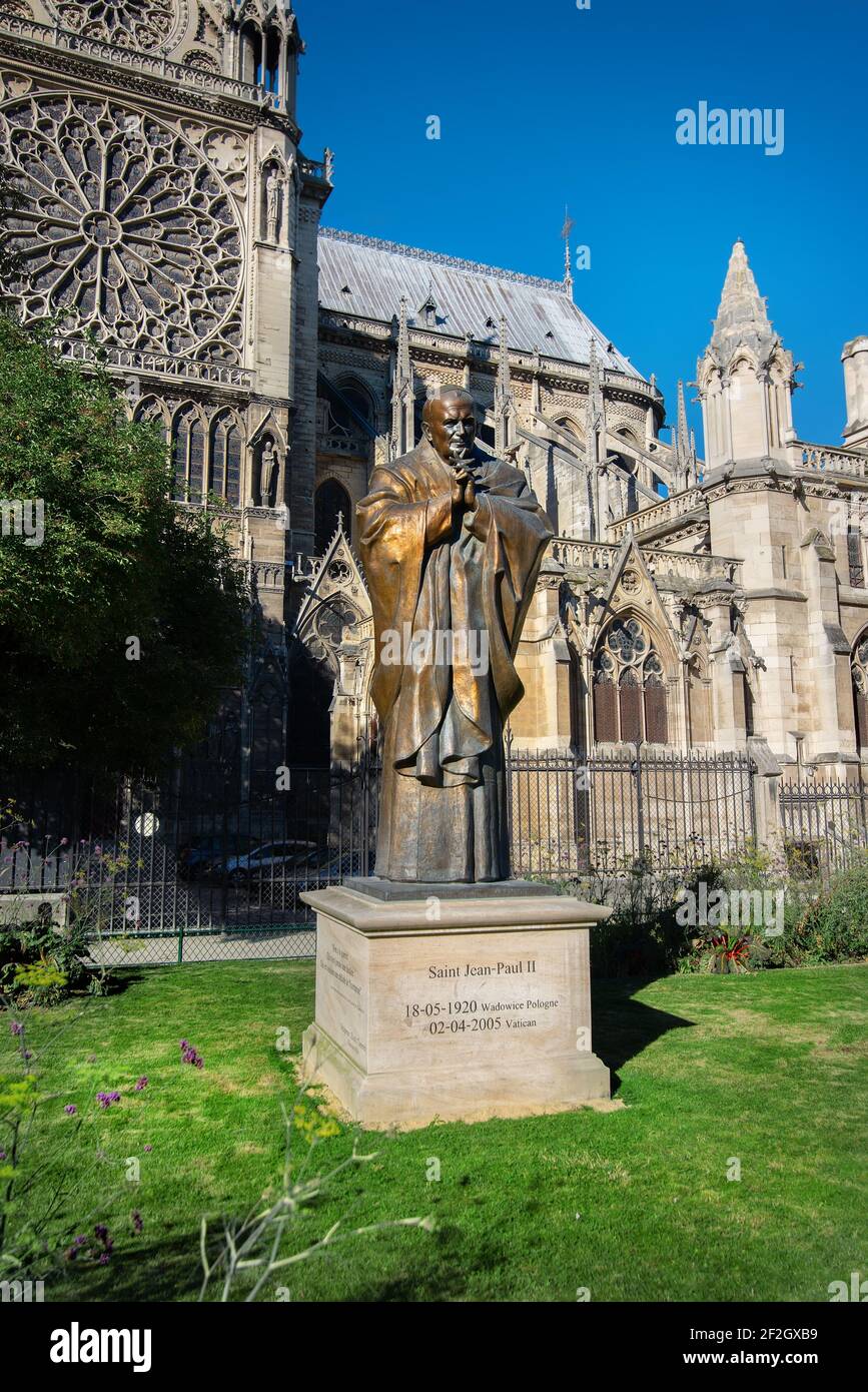 Pope John Paul II statue on side of church Notre Dame of Paris, France. Stock Photo
