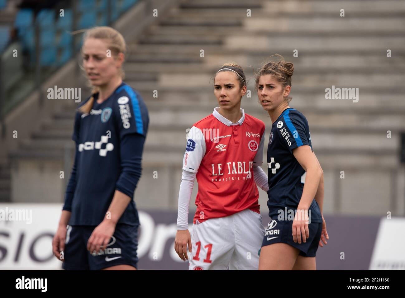 Tanya Romanenko of Stade de Reims and Camille Catala of Paris FC during the  Women's French championship D1 Arkema football match between Paris FC and  Stade de Reims on February 22, 2020