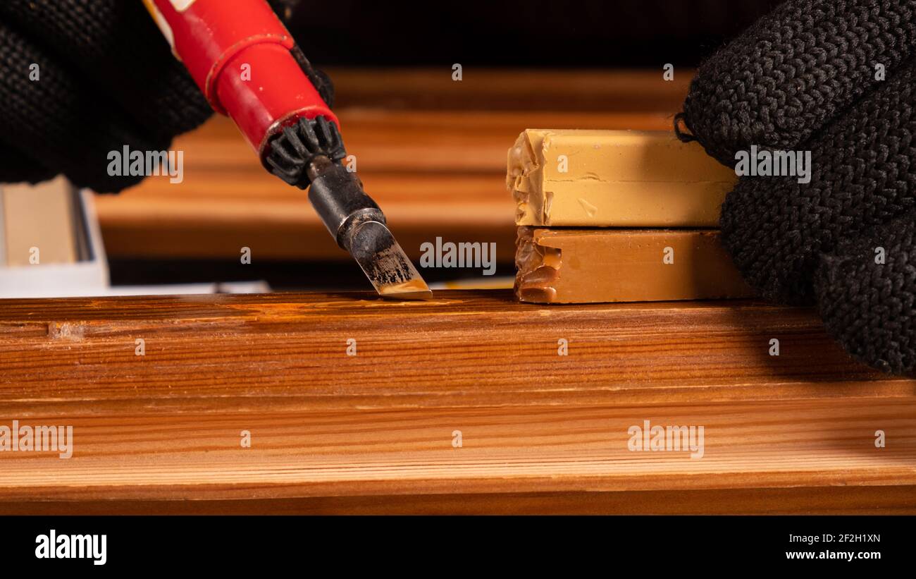 restoration of wooden doors with wax.,elimination of defects chips