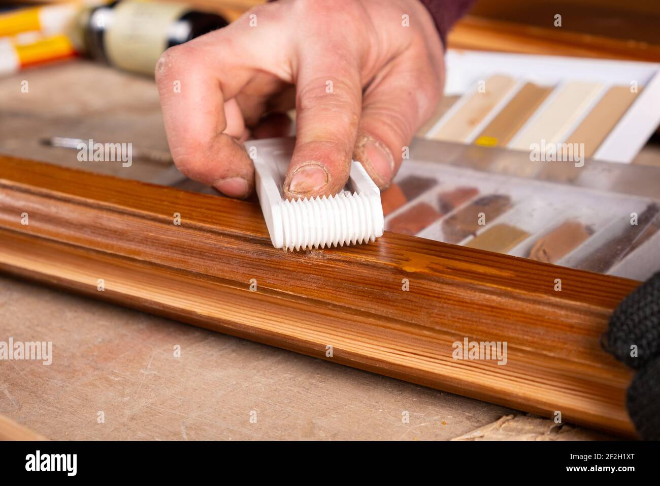 restoration of wooden doors,elimination of defects chips Stock Photo