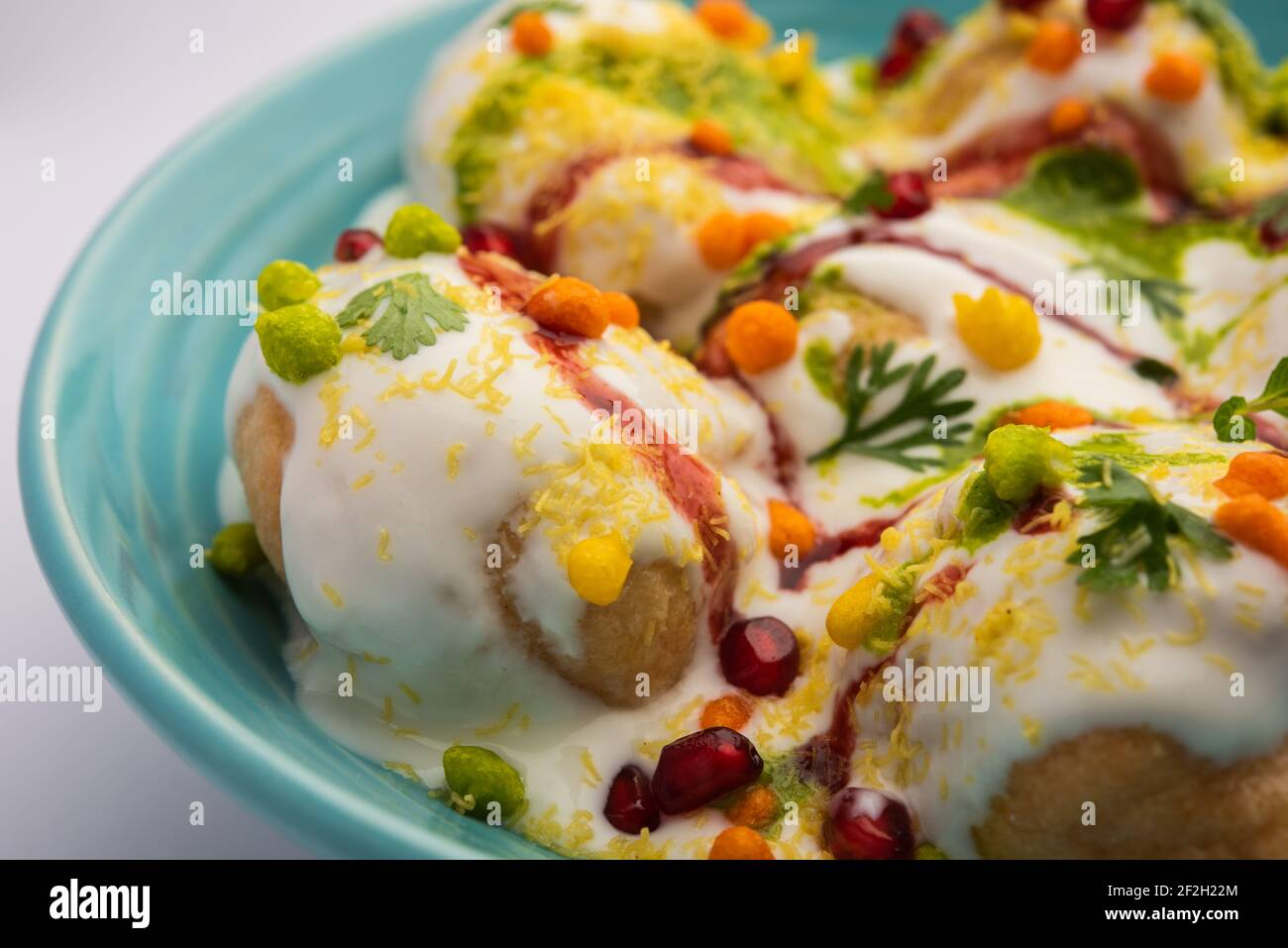 Dahi vada or bhalla is a type of chaat originating from the Indian and