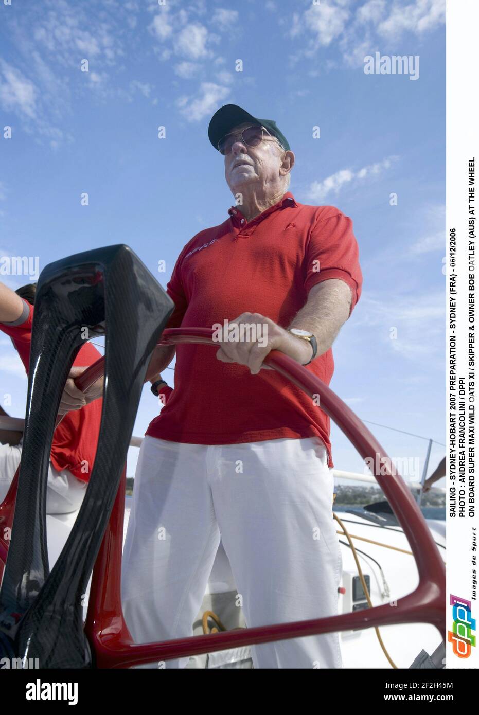 SAILING - SYDNEY-HOBART 2007 PREPARATION - SYDNEY (FRA) - 06/12/2006 PHOTO : ANDREA FRANCOLINI / DPPI ON BOARD SUPER MAXI WILD OATS XI / SKIPPER & OWNER BOB OATLEY (AUS) AT THE WHEEL Stock Photo