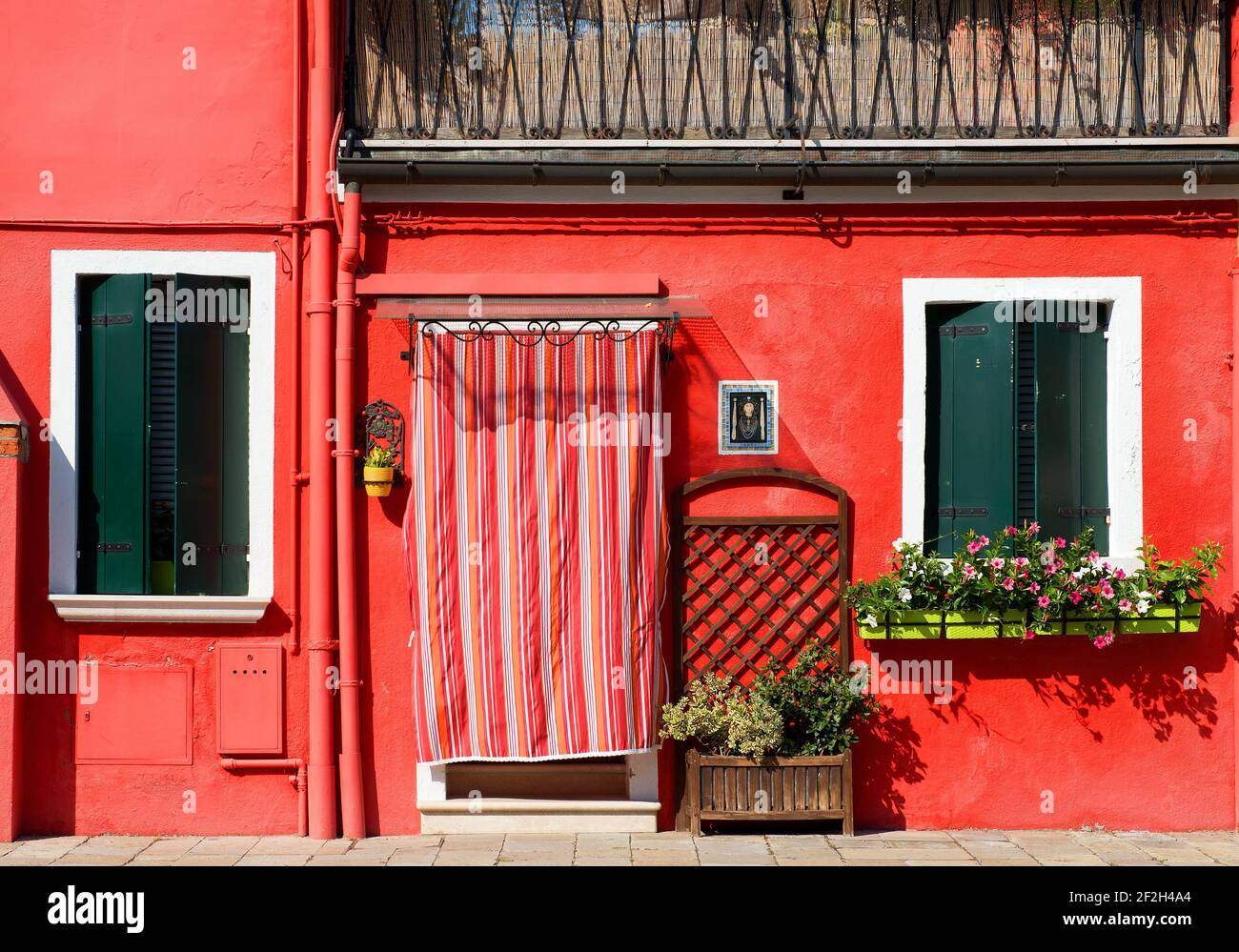 Red house on Burano island in Venice, Italy Stock Photo