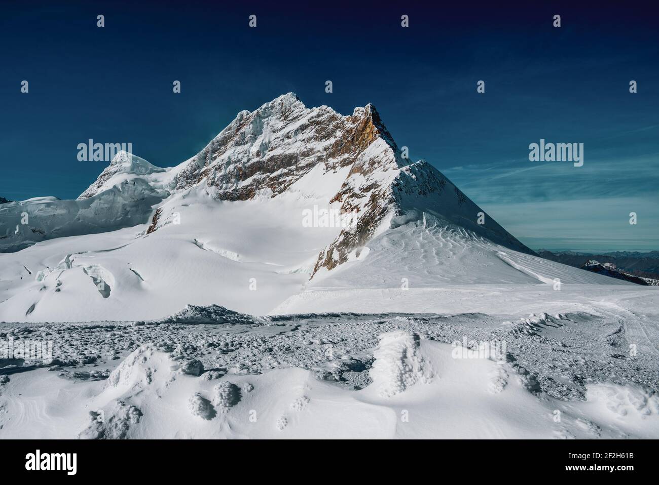 Panoramic view of the Swiss Alps in winter Stock Photo - Alamy