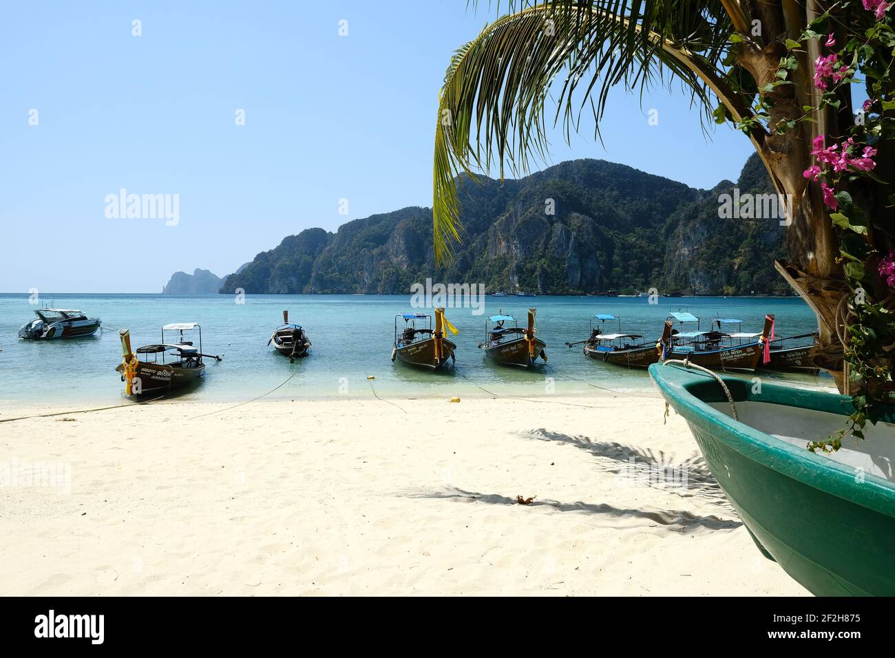 Boats ashore in Phi Phi Island. Stock Photo
