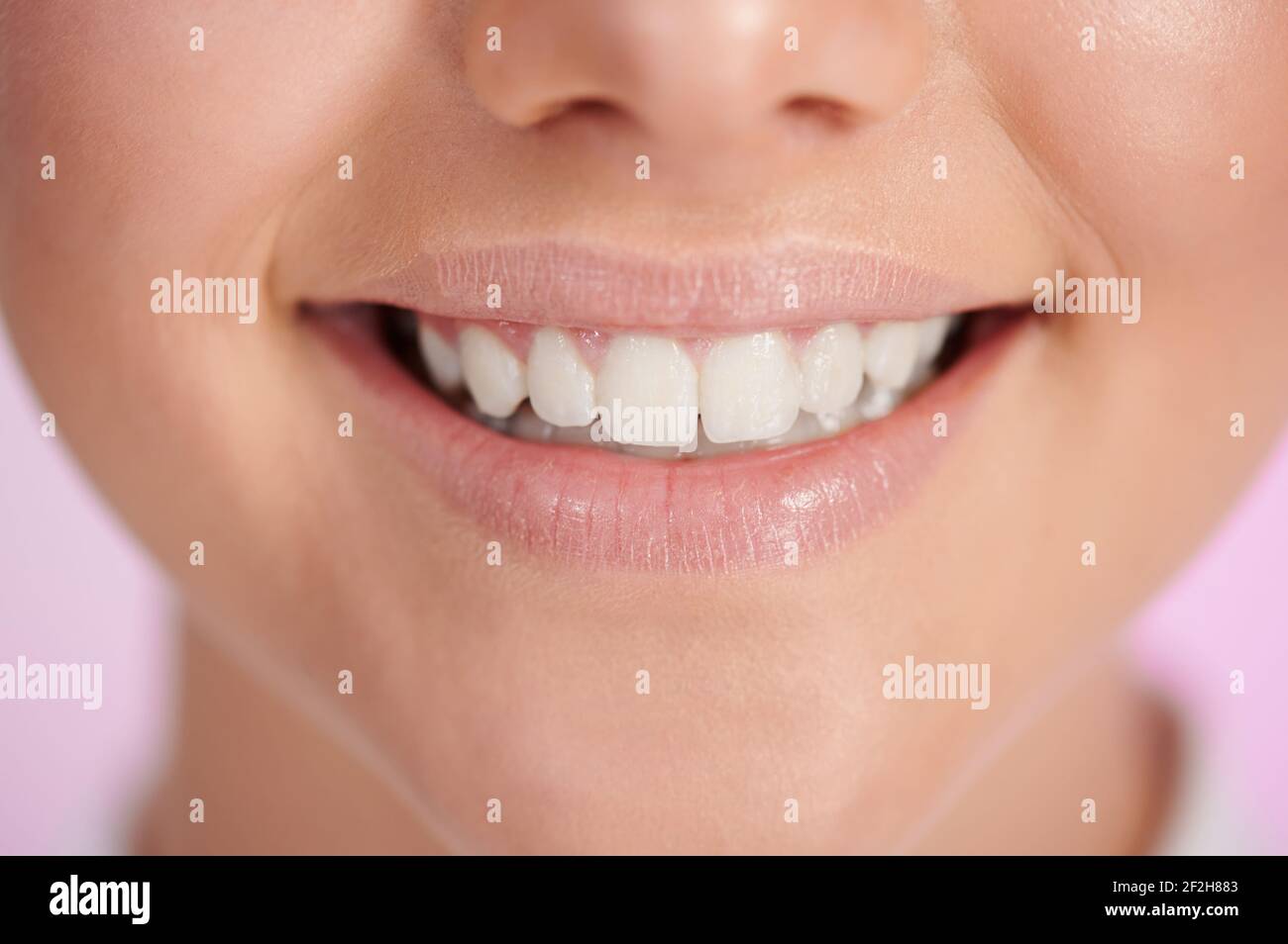 Happy smile with white teeth macro close up view Stock Photo
