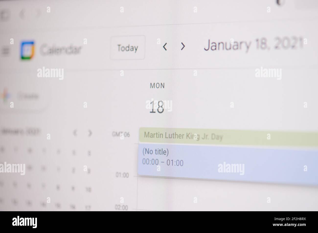 New york, USA - February 17, 2021: Martin Luther King day 18 of January on google calendar on laptop screen close up view. Stock Photo