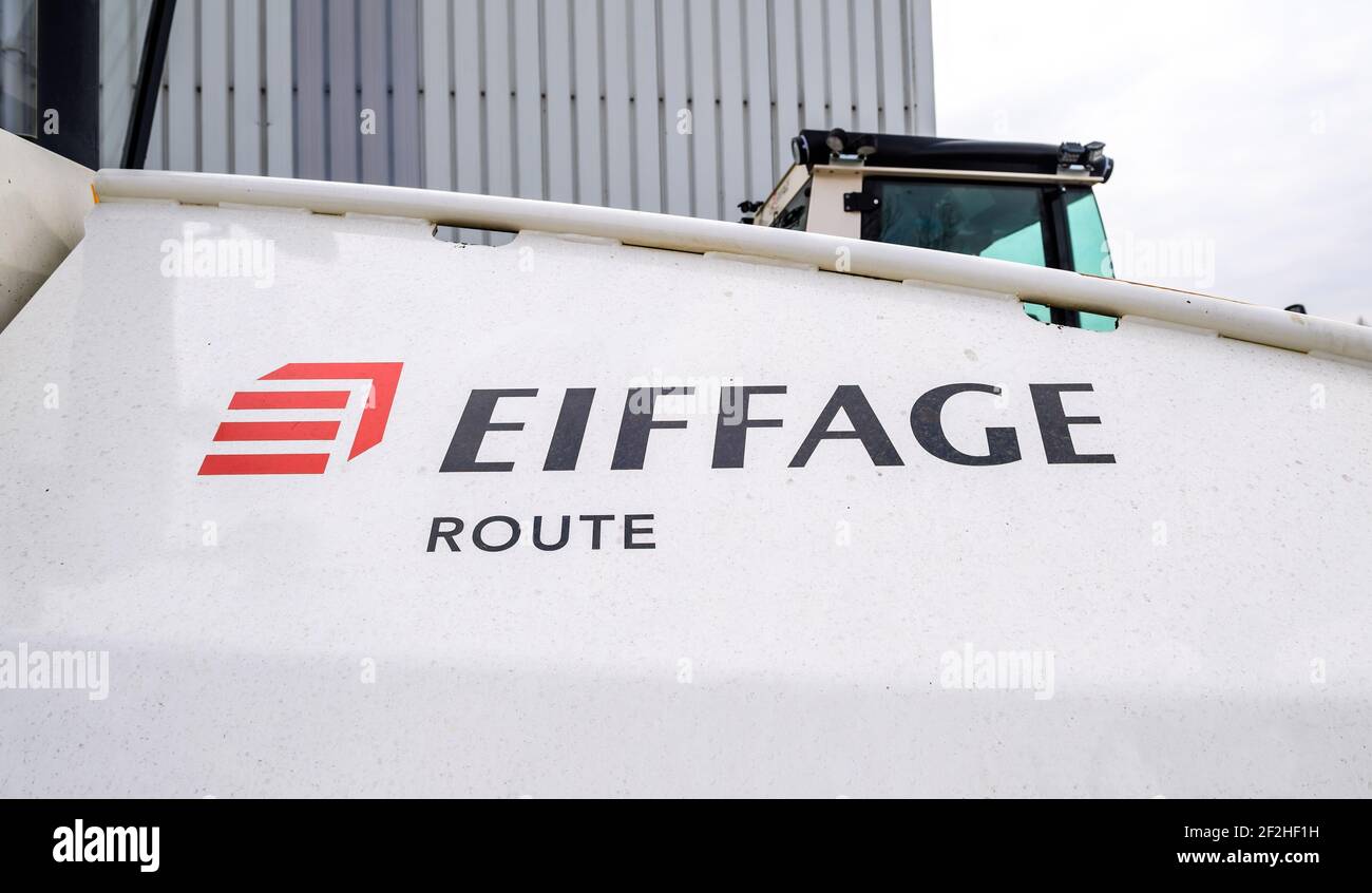 Eiffage Route singage logotype on a modern paver - French civil engineering construction company. As of 2010 it was the third largest company of its Stock Photo