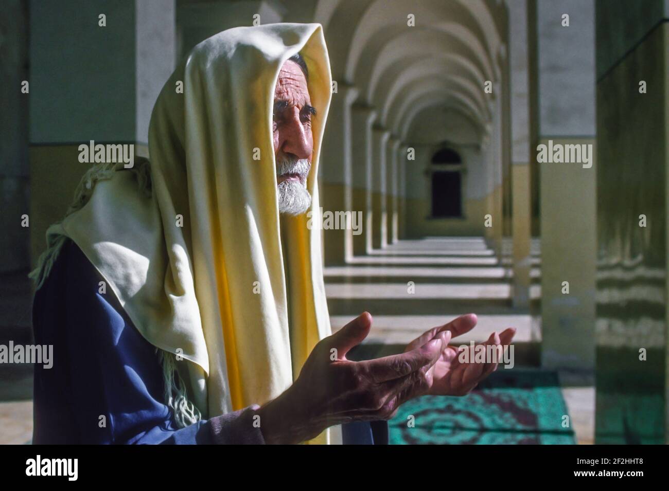 Elderly man in prayer Grand mosque Damascus Syria Stock Photo