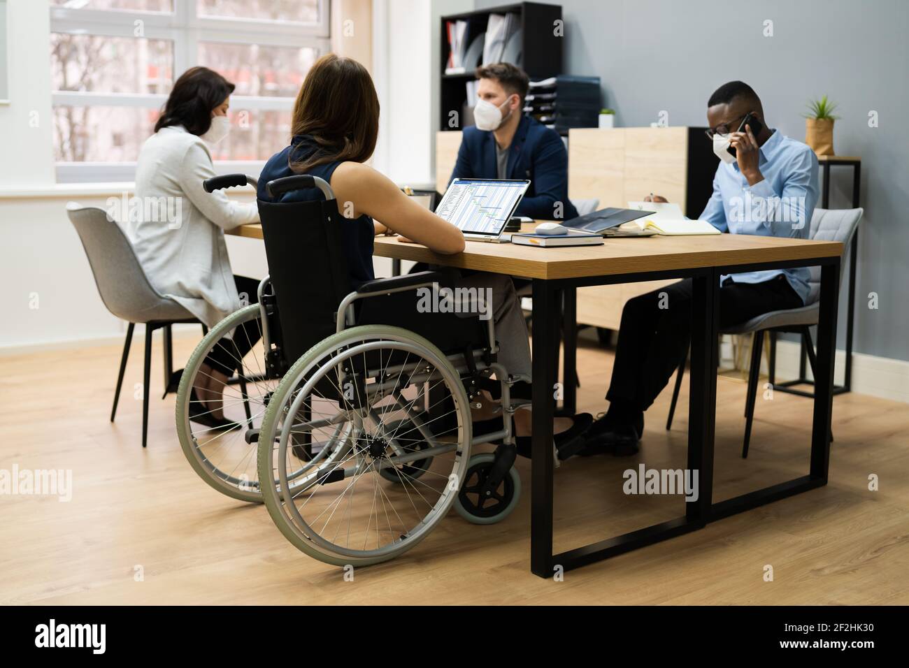 Diverse Disabled Business Worker People In Wheelchair Wearing Face Mask