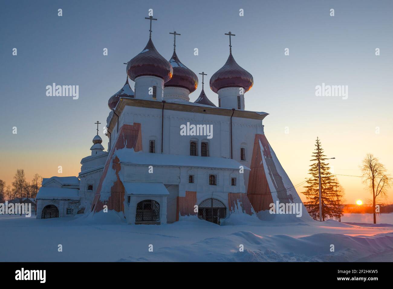 The ancient Cathedral of the Nativity of Christ against the backdrop of the February dawn. Kargopol. Arkhangelsk region, Russia Stock Photo