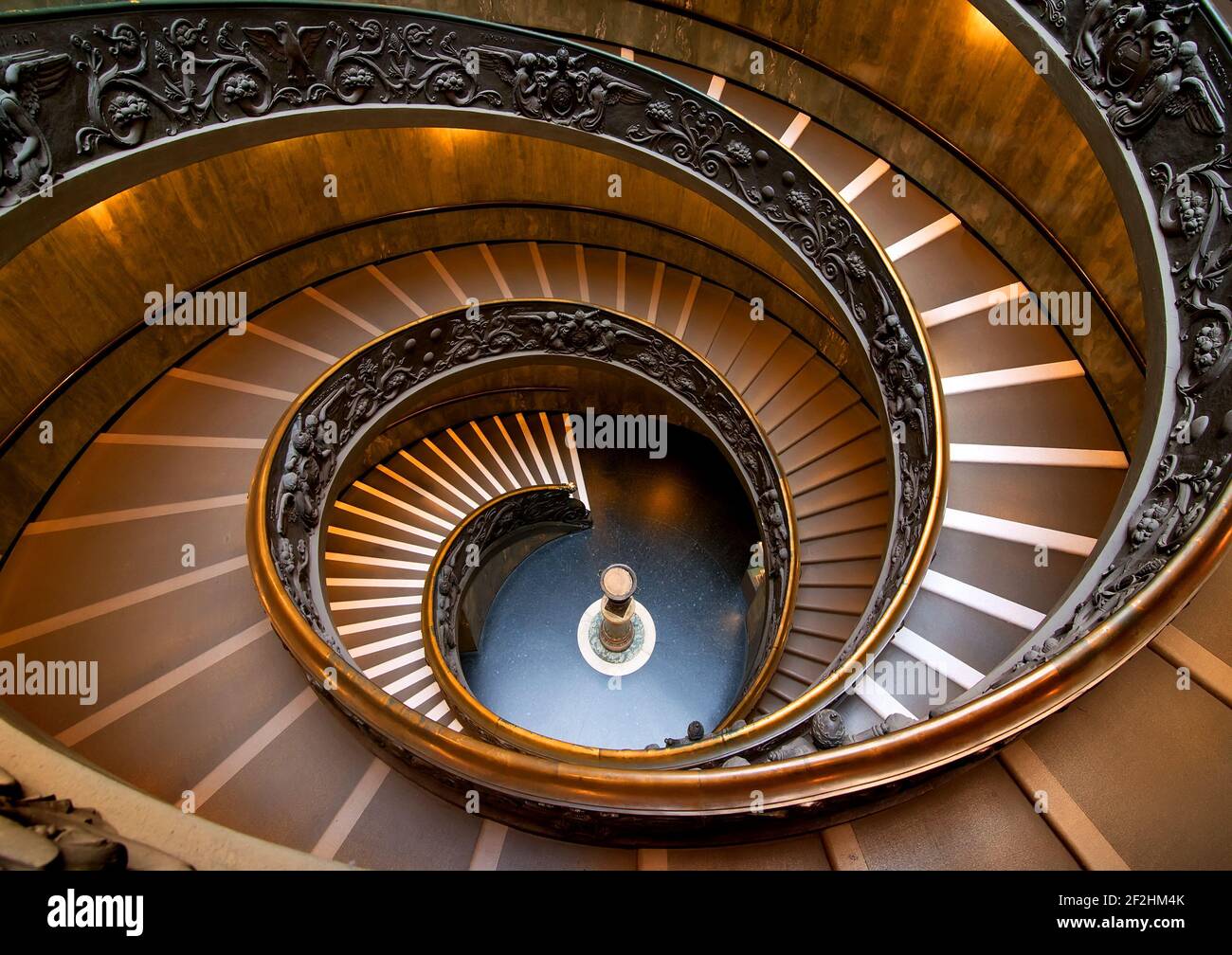 Round staircase in Vatican museum, view from above. Vatican on August 19, 2016 in Rome, Italy Stock Photo