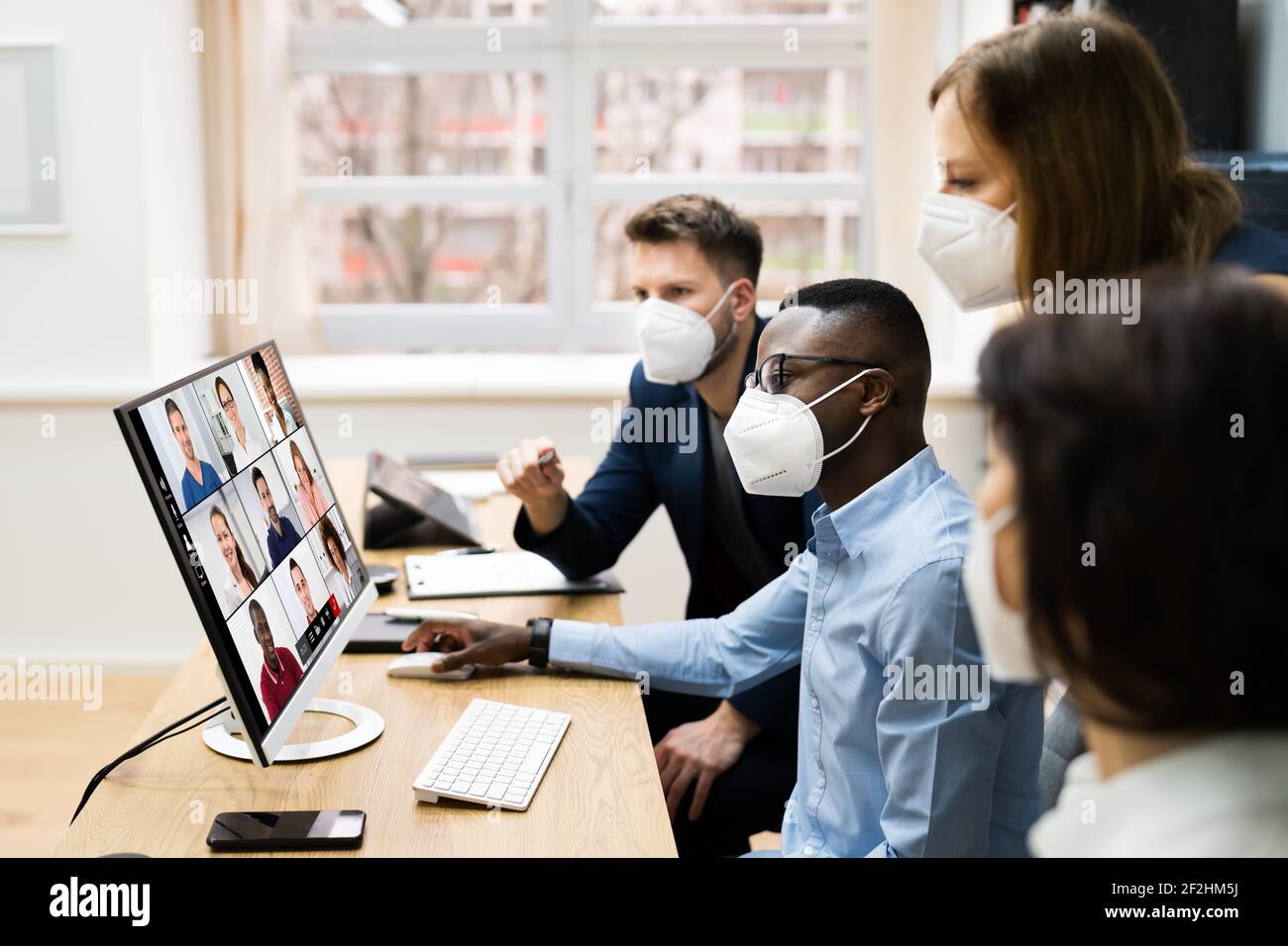 Video Conference Call At Business Meeting. Group Conferencing Stock