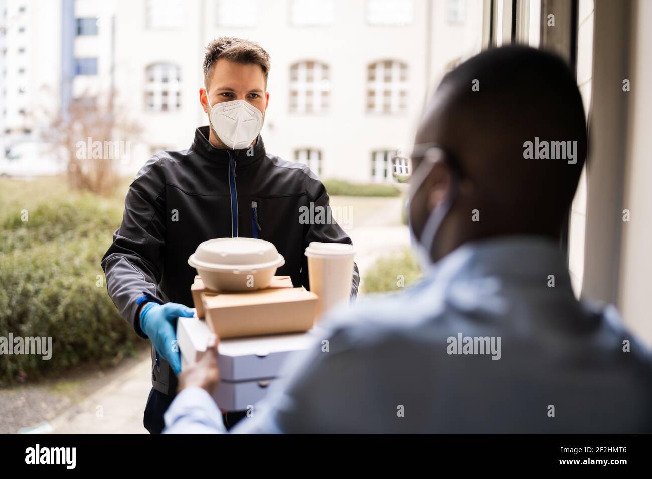 Man face mask delivering hi-res stock photography and images - Alamy