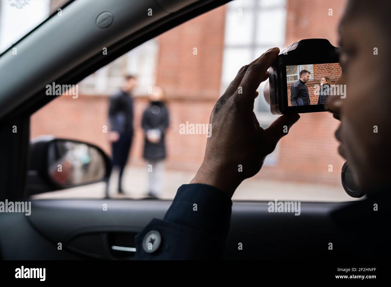 Private Detective Spying On Cheating Woman Wife Stock Photo