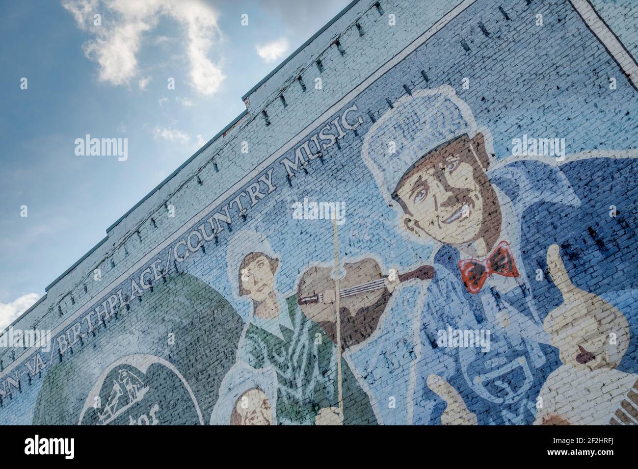Detail of a mural with counry music legends, stars Jimmie Rodgers and the Carter family on a brick building in Bristol, Virginia. Stock Photo