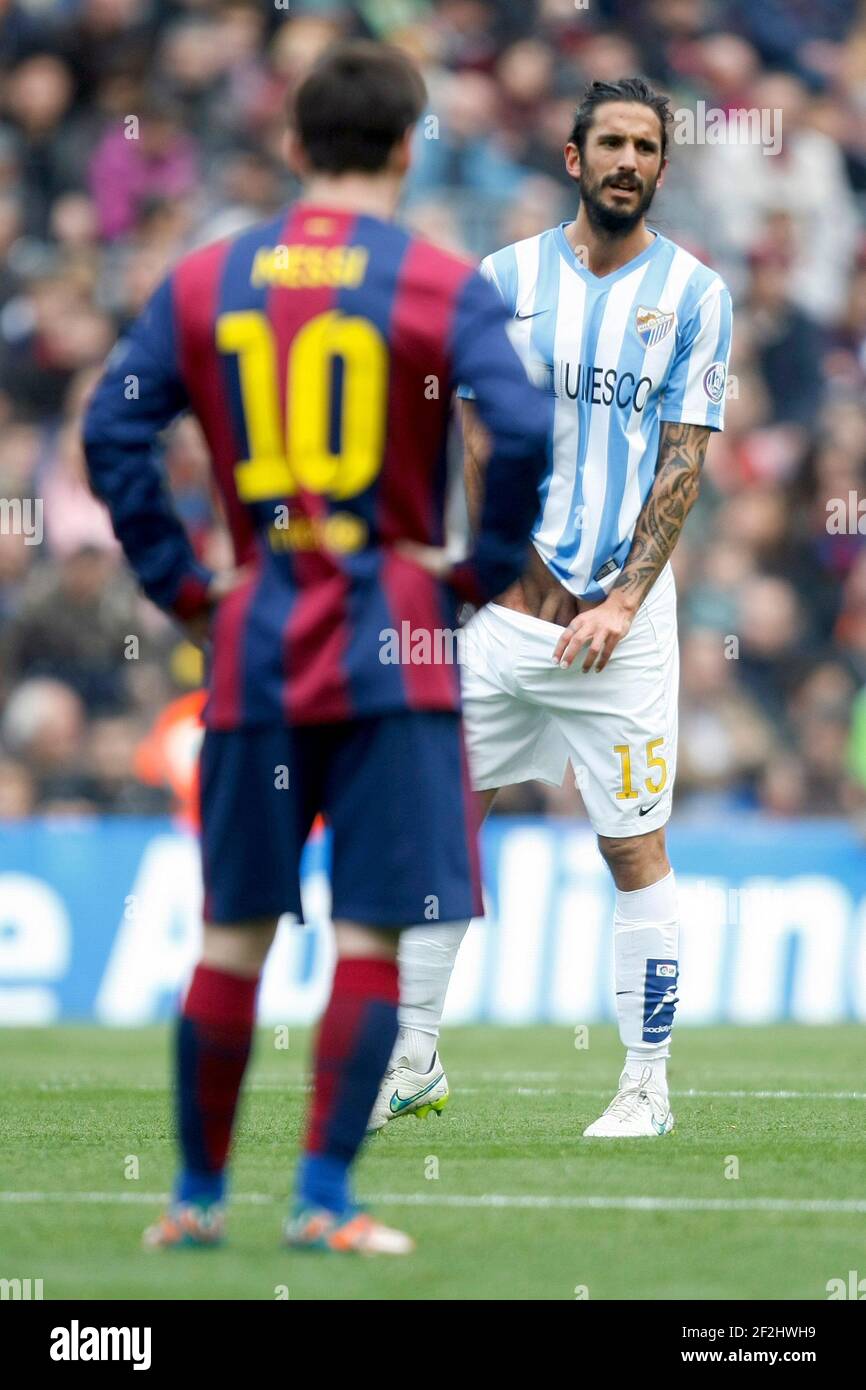 Leo Messi of Barcelona watching Marcos Angeleri of Malaga playing with his shorts, during the Spanish Championship 2014/2015 Liga football match between FC Barcelona and Malaga on February 21, 2014 at Camp Nou stadium in Barcelona, Spain. Photo Bagu Blanco / DPPI - Stock Photo