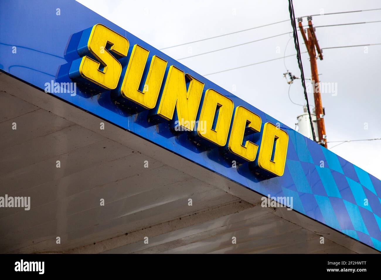 Sunoco gas station sign on top of station off of Route 33. (Photo by Stephen Zenner / SOPA