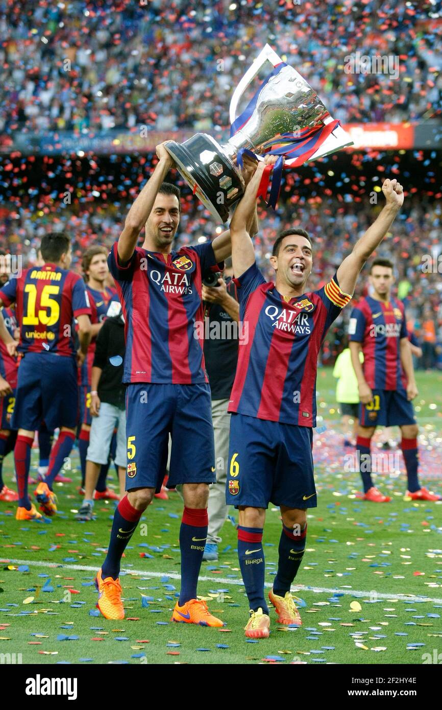 Xavi Hernandez and Sergio Busquets of Barcelona during the celebration of the victory of FC Barcelona in the Spanish League football match between FC Barcelona and Deportivo on May 23, 2014 at Camp Nou stadium in Barcelona, Spain. Photo Bagu Blanco / DPPI Stock Photo