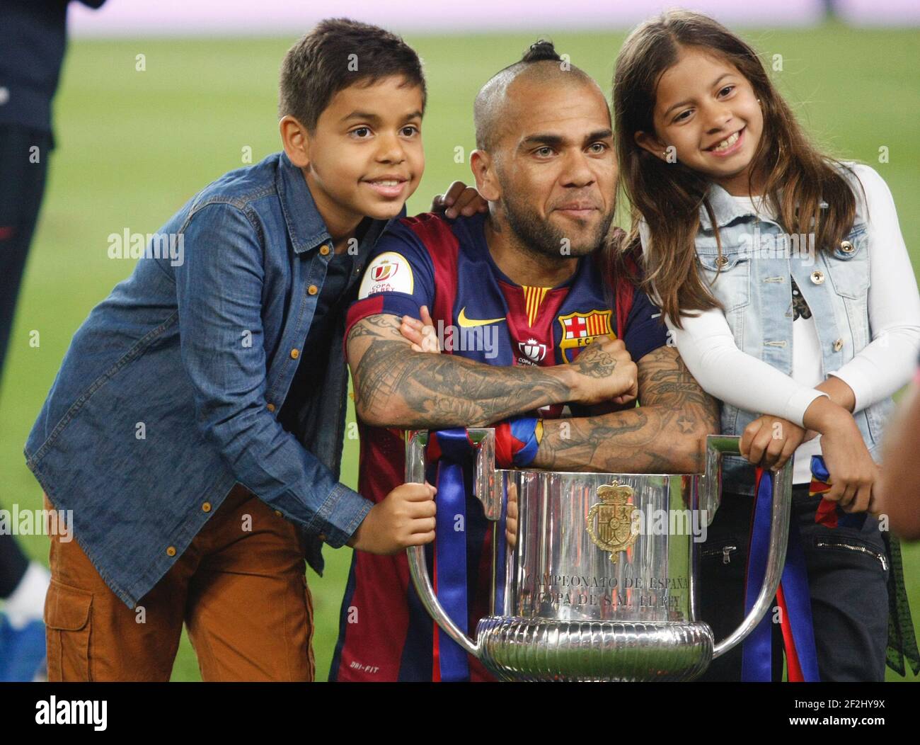 Daniel Alves of Barcelona celebrating with his sons the victory during the Spanish Copa del Rey 2014/2015 football match (final) between Athletic club and Barcelona on May 30, 2015 at camp Nou stadium in Barcelona, Spain. Photo Bagu Blanco / DPPI Stock Photo