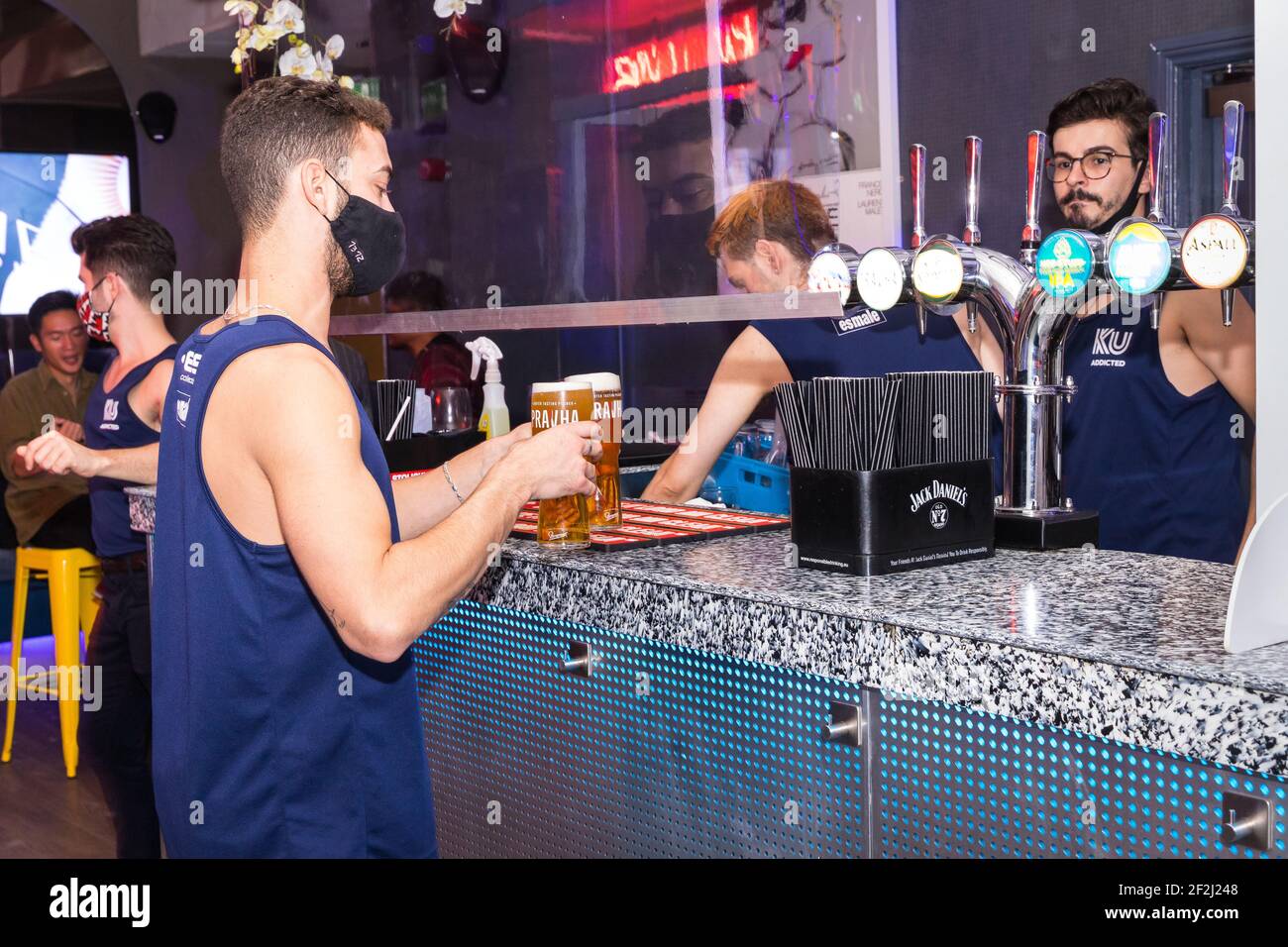 bar staff at socially distanced bar in London Stock Photo Alamy