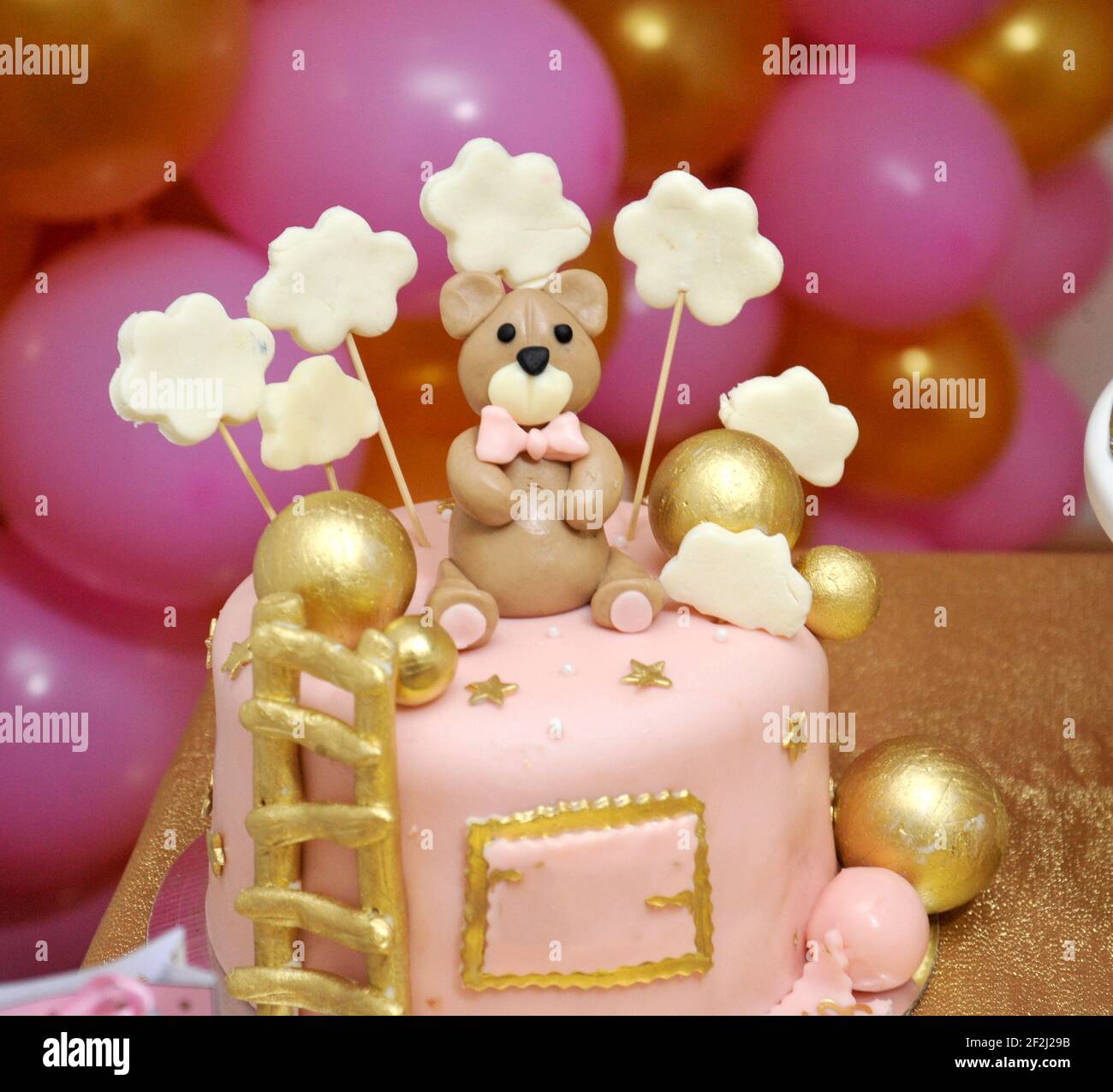 baby girl birthday cake with cute teddy bear figurines image Stock Photo -  Alamy