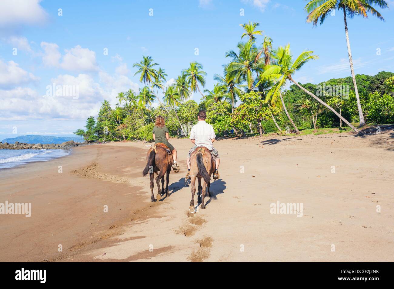 Horseback riding on beach, Drake Bay, Corcovado National Park, Osa
