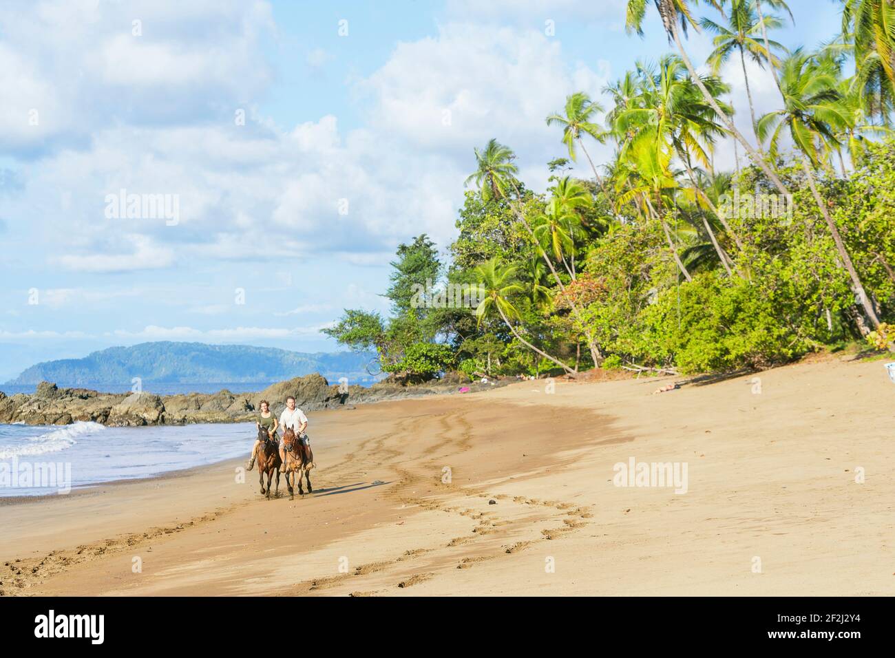 Horseback riding on beach, Drake Bay, Corcovado National Park, Osa