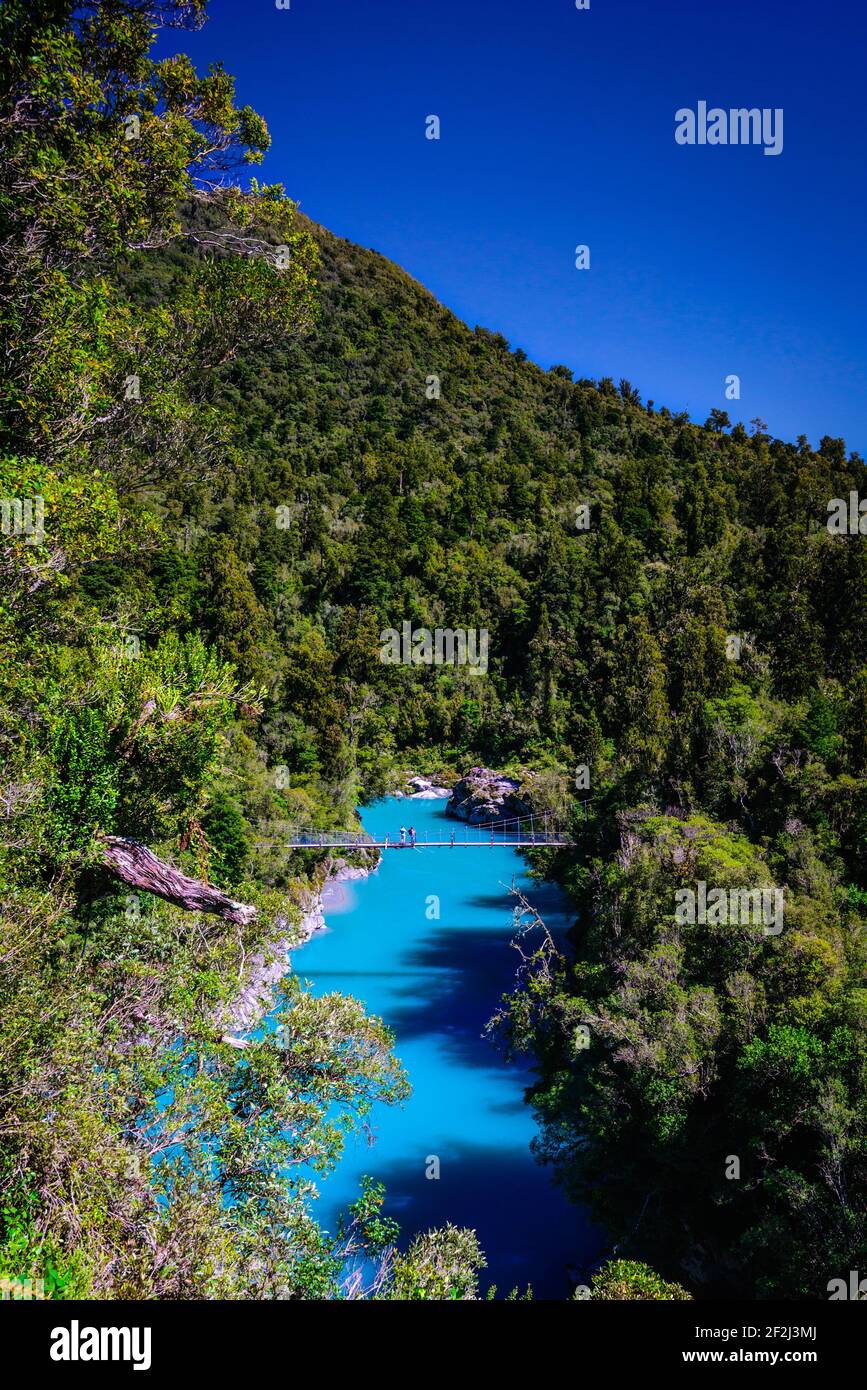 Vibrant Turquoise Water In Hokitika Gorge Surrounded By Trees New Zealand Nature Clear Sky And Sunny Day Stock Photo Alamy