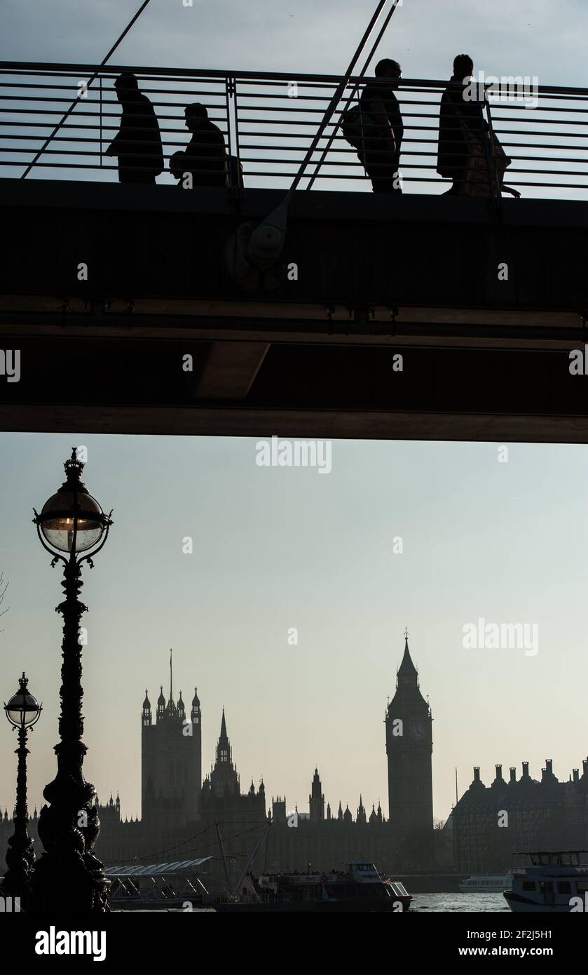 Silhouette of Big Ben and the Houses of Parliament from over the River Thames Stock Photo