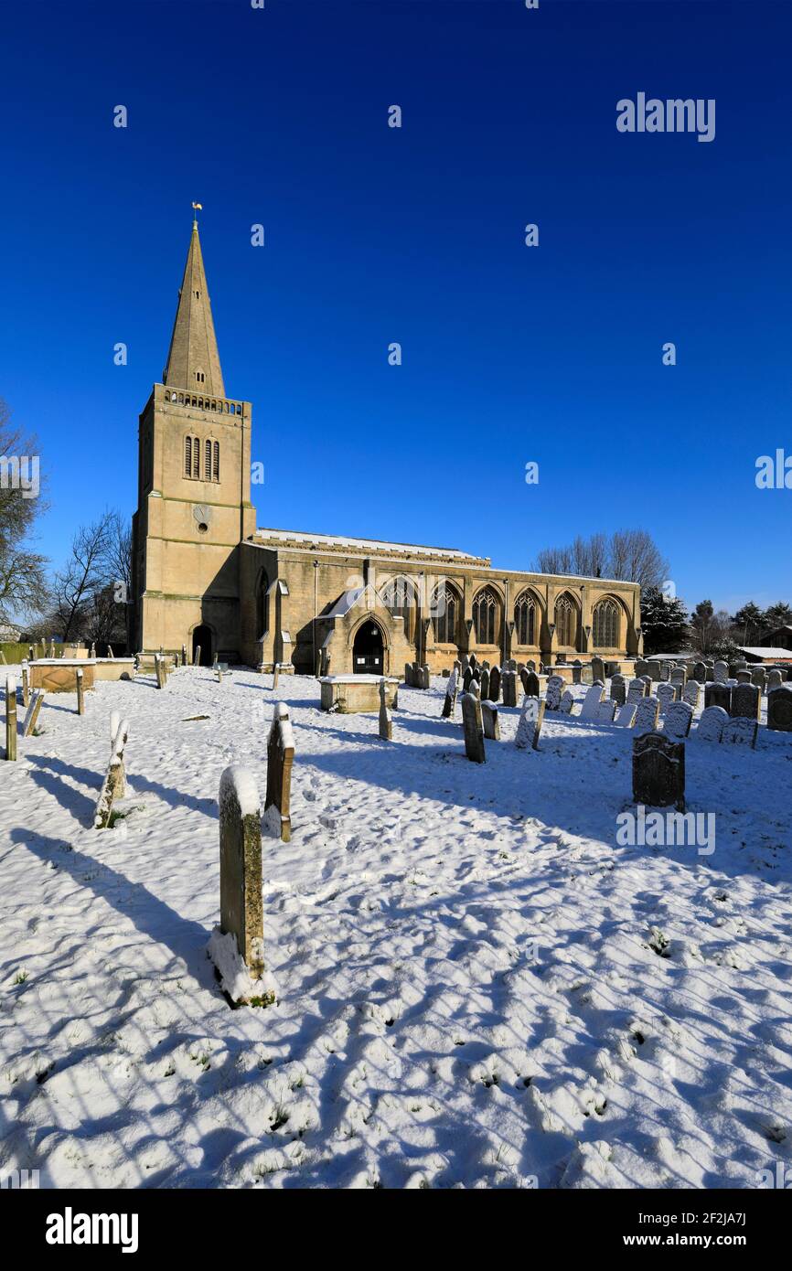Winter snow over the Priory church, Deeping St James, Lincolnshire County, England, UK Stock Photo