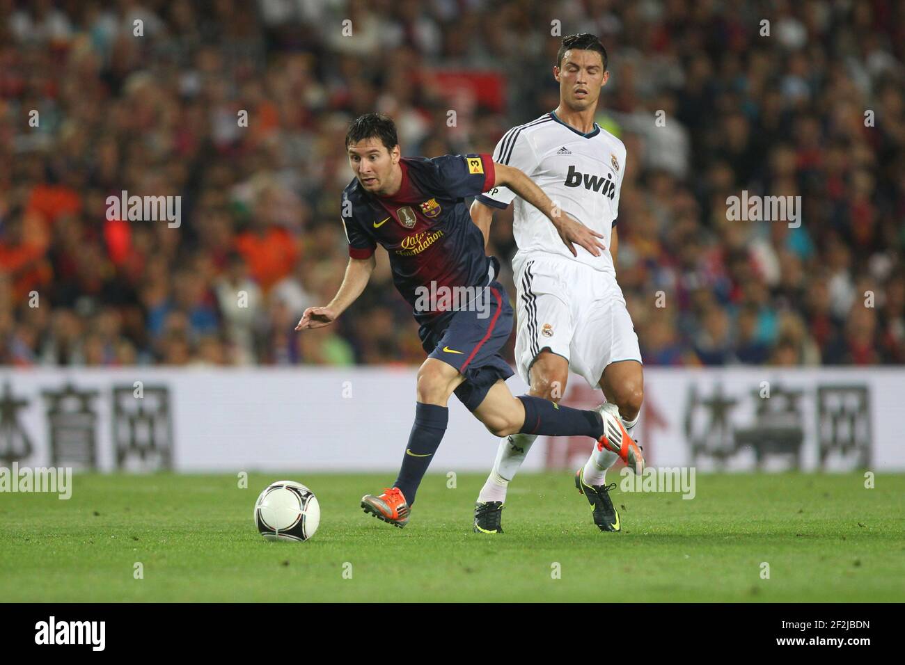 FOOTBALL - SPANISH SUPER CUP 2012 - 1ST LEG - FC BARCELONA v REAL MADRID - 23/08/2012 - PHOTO MANUEL BLONDEAU / AOP.Press / DPPI - LIONEL MESSI AND CRISTIANO RONALDO Stock Photo