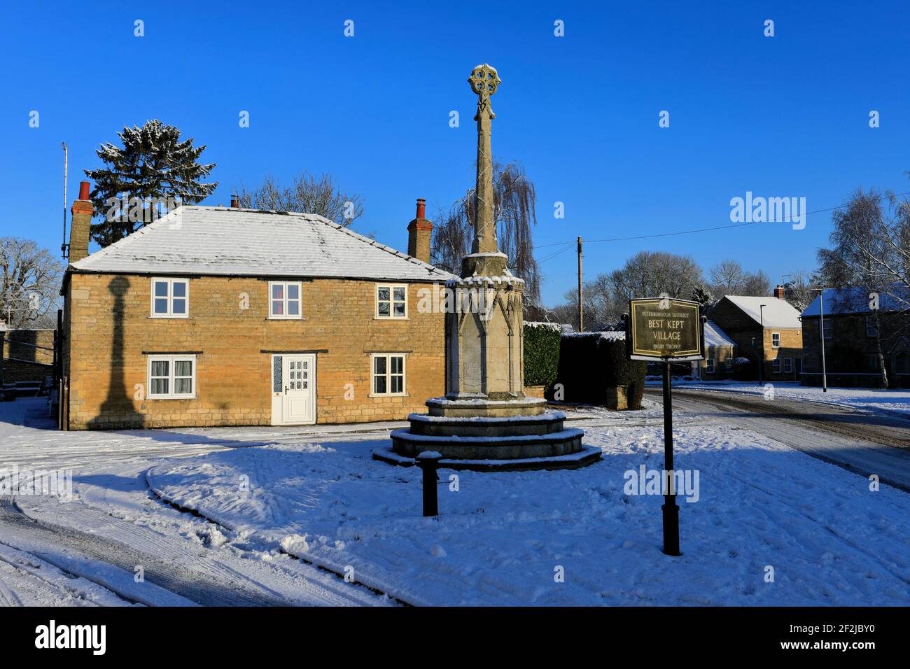 The ancient cross on the village green, Peakirk village, Cambridgeshire