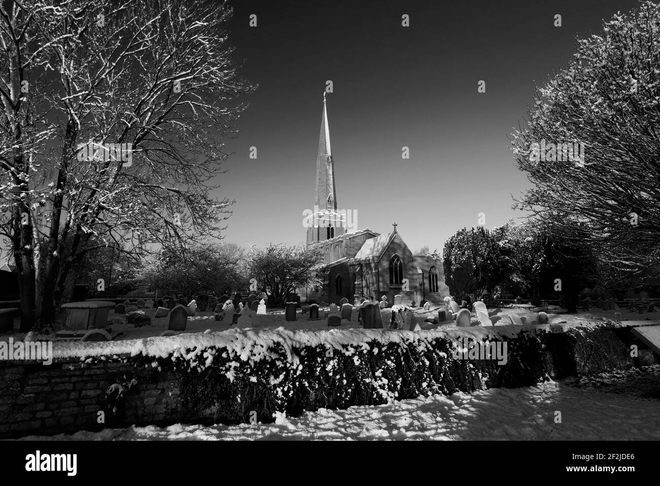 Snow over St Benedicts church, Glinton village, Cambridgeshire; England