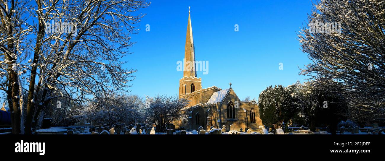 Snow over St Benedicts church, Glinton village, Cambridgeshire; England