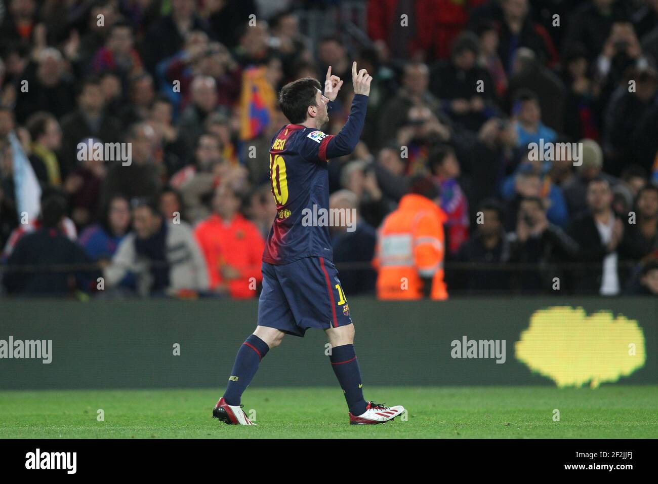 Lionel messi december 2012 celebrates hi-res stock photography and ...