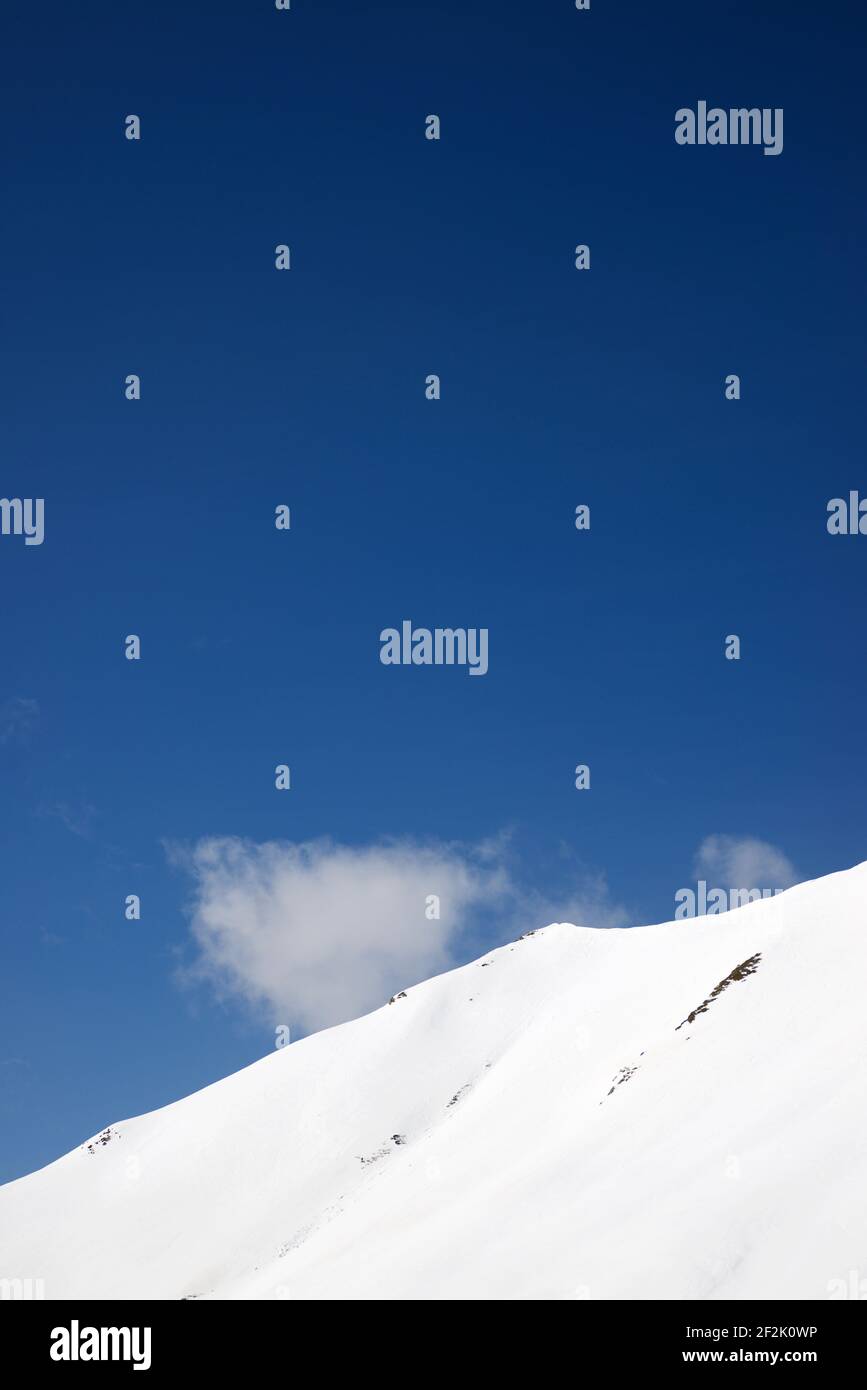 Snowy mountains in the Pyrenees in Canfranc Valley in Spanish Pyrenees. Stock Photo