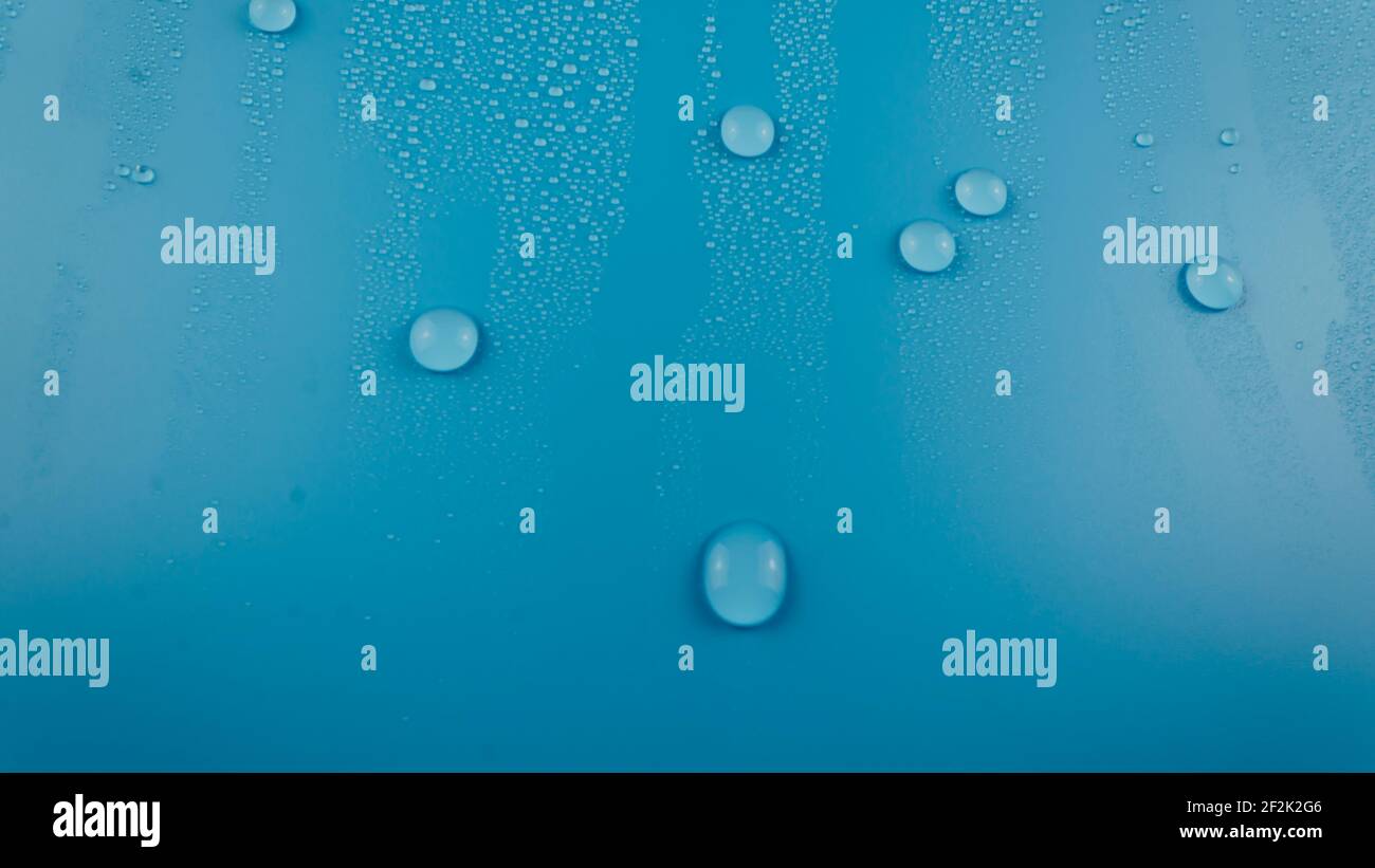 Waterdrops on a blue background. Background. Water drops Stock Photo